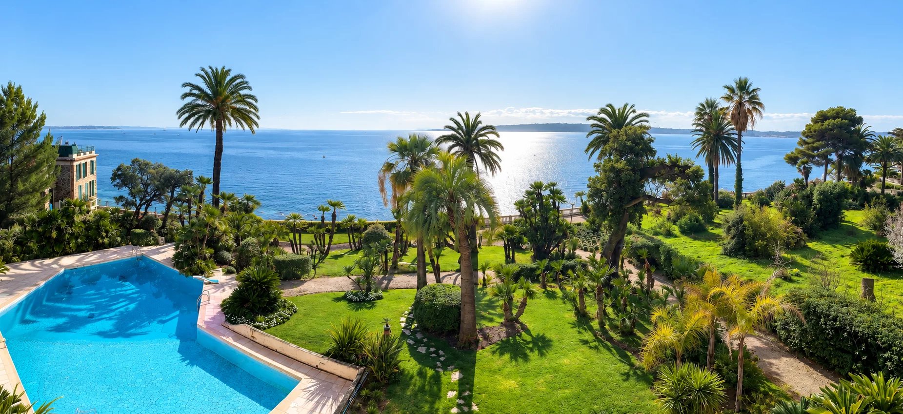 Sea view from a residence with swimming pool and gardens in Cannes, Palm Beach.
