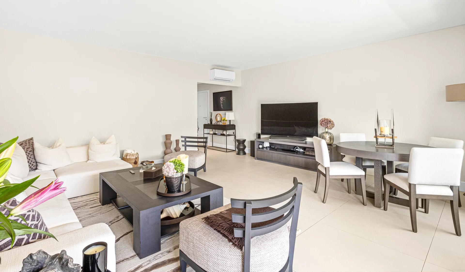 Renovated apartment in Cannes Interior of a renovated apartment with living room, dining room and access to a terrace.