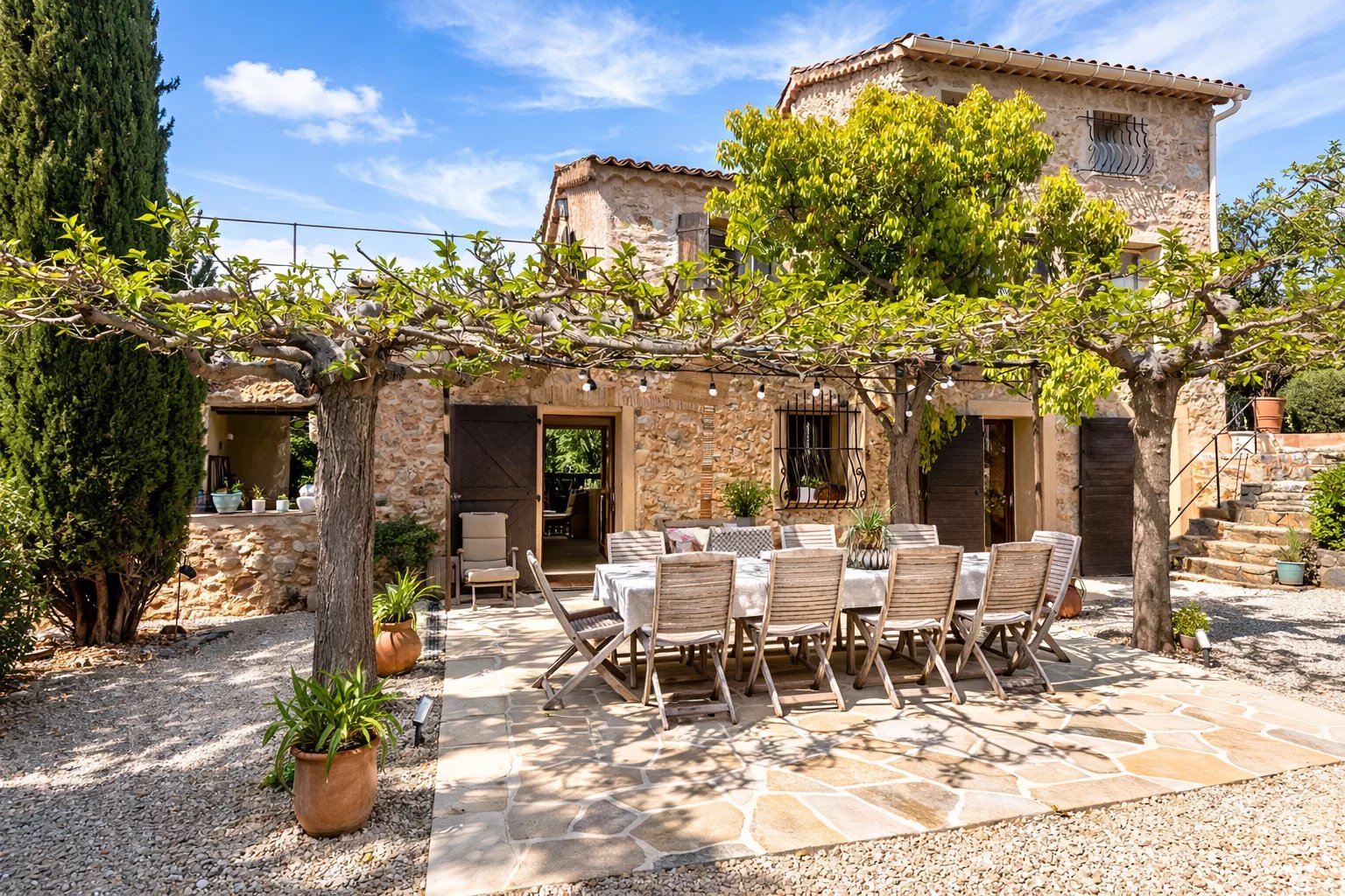 Stone villa in Opio Stone villa with terrace and dining table, surrounded by greenery in Opio.