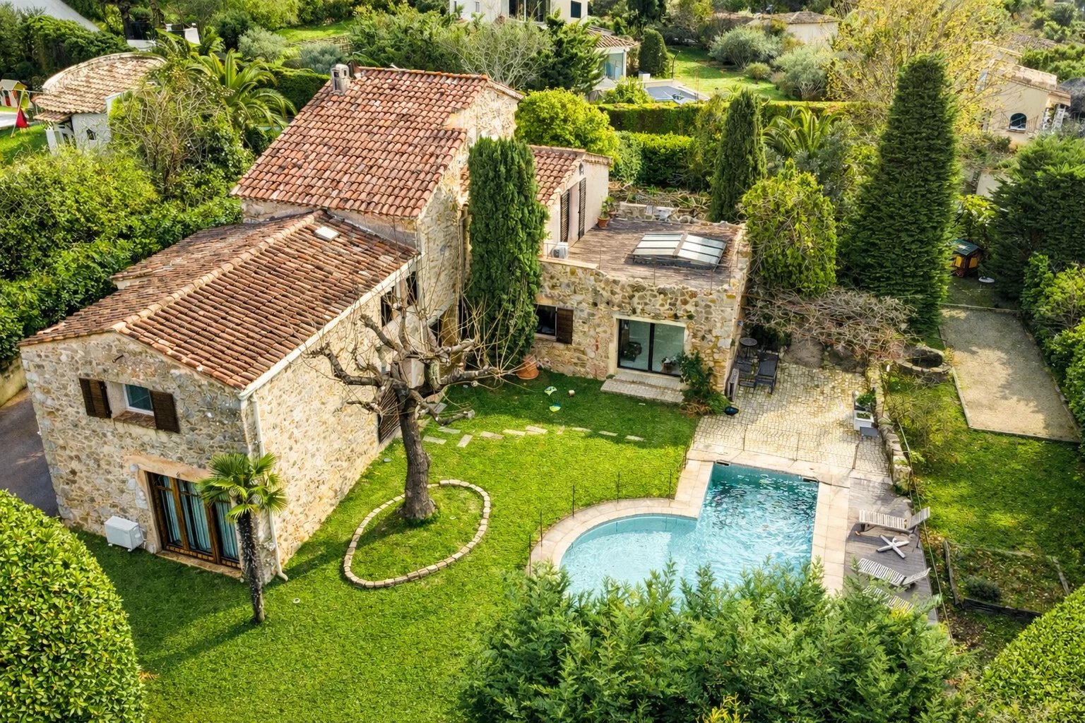 Villa in Opio with swimming pool Stone villa with swimming pool on a wooded plot in Opio, France.