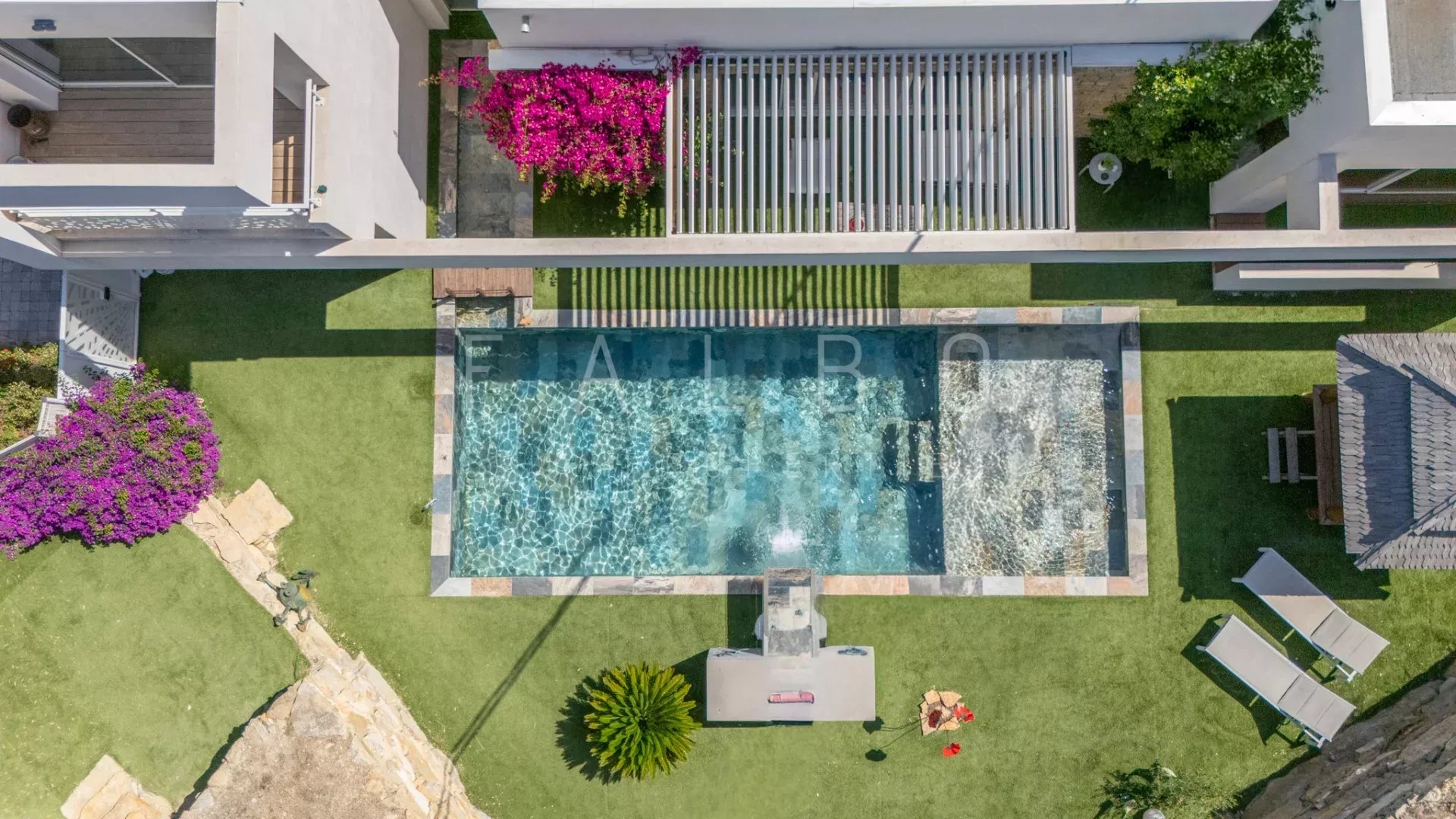 Aerial view of a contemporary villa with swimming pool and garden, La Ciotat.