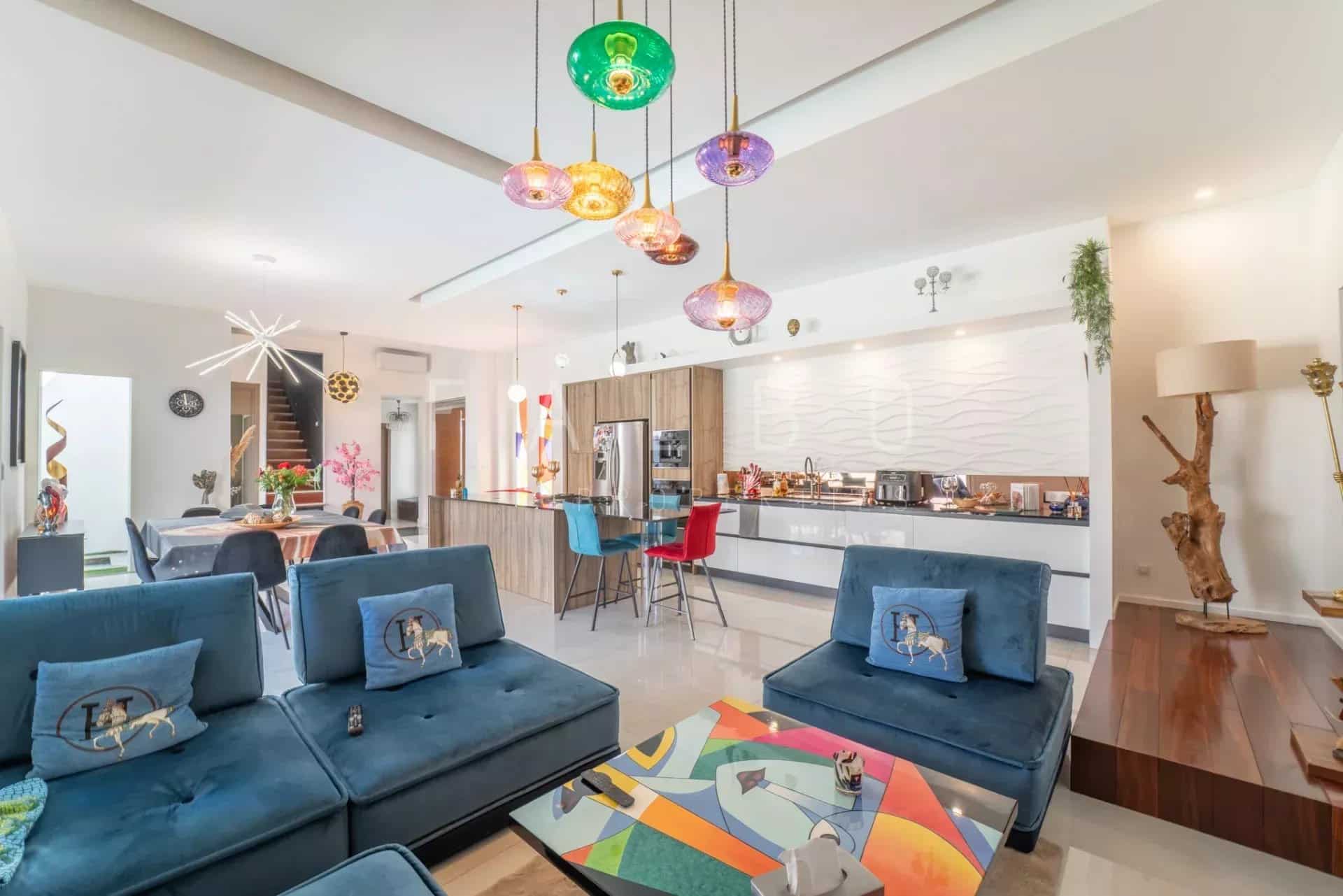 Modern interior of a villa with living room and open kitchen in La Ciotat.