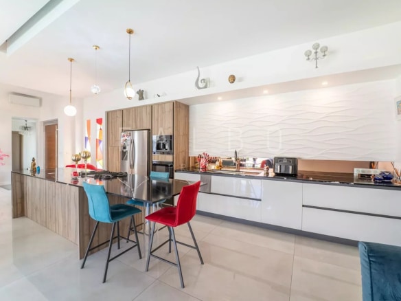 Modern and spacious kitchen of a contemporary villa in La Ciotat.