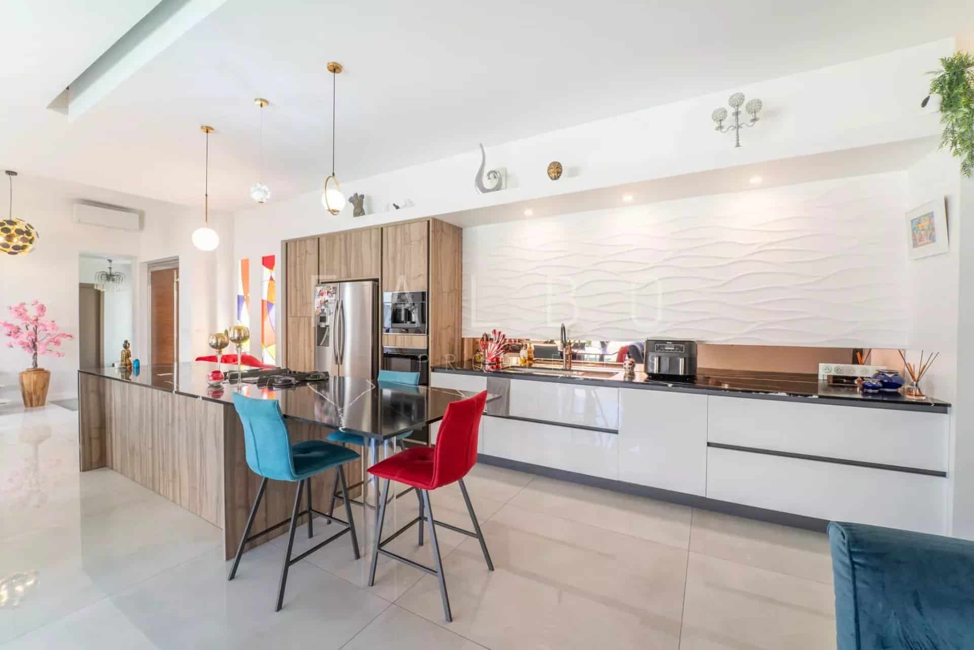 Modern and spacious kitchen of a contemporary villa in La Ciotat.