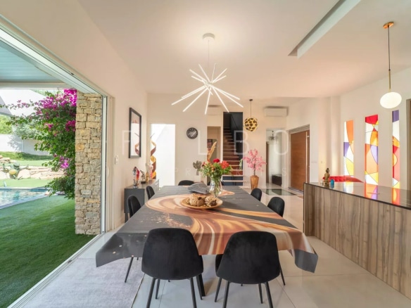 Interior of a contemporary villa with dining room and kitchen, La Ciotat