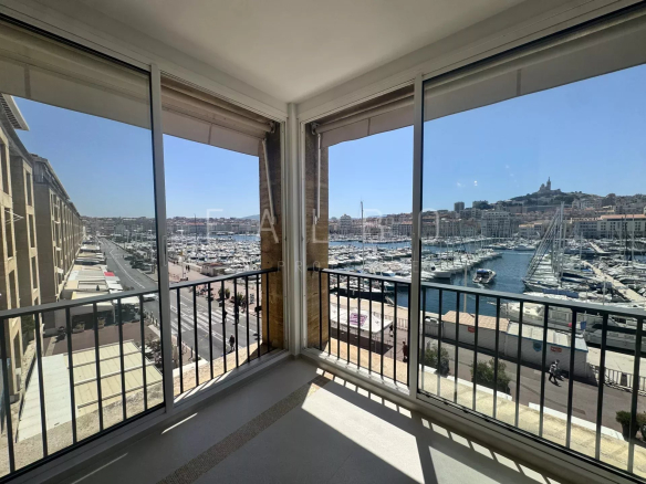 Panoramic view of the Old Port of Marseille from a renovated apartment.