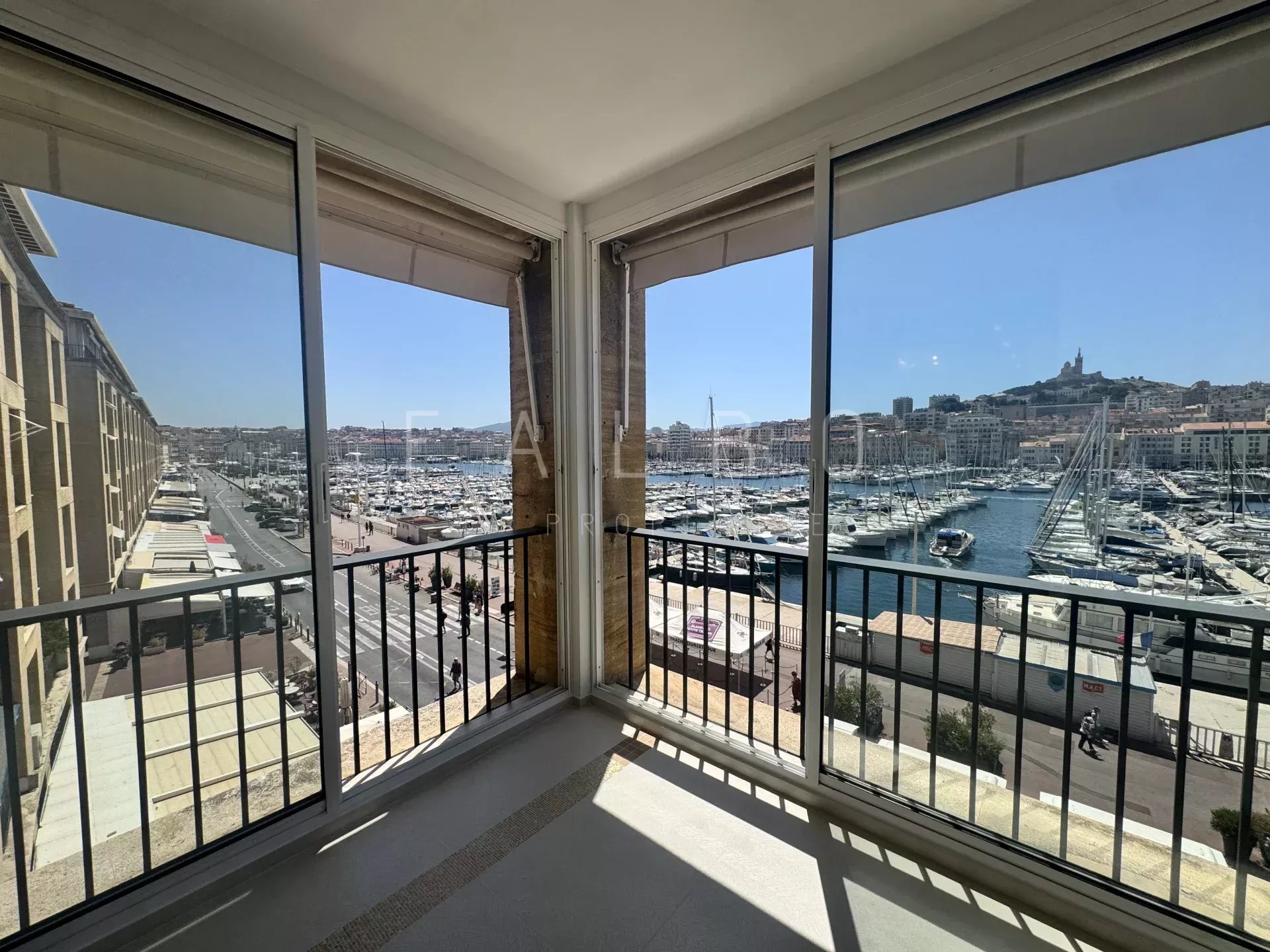 Panoramic view of the Old Port of Marseille from a renovated apartment.
