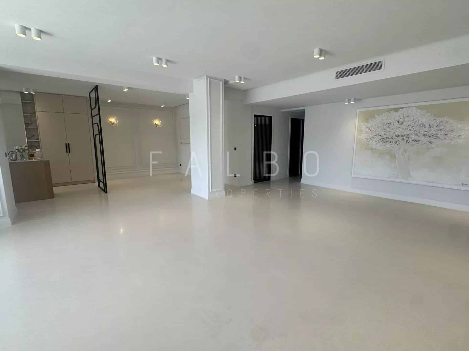 Interior of a renovated apartment with light flooring and modern walls in Marseille.