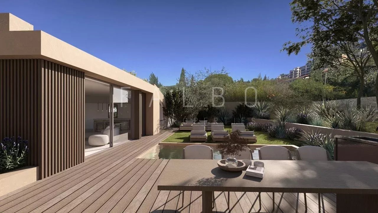 Modern villa with sea view in Cassis Terrace of a modern villa with outdoor furniture and garden in Cassis.