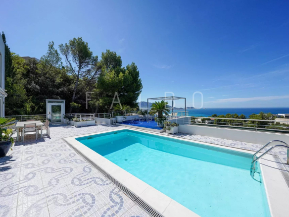 Contemporary villa with swimming pool and sea view in Marseille, sunny terrace.