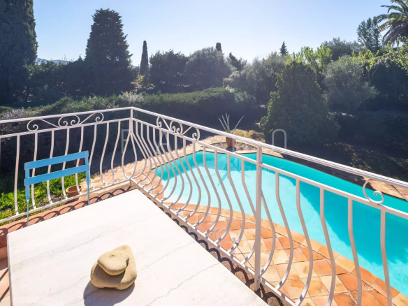 View from a terrace with swimming pool and garden in a villa in La Ciotat