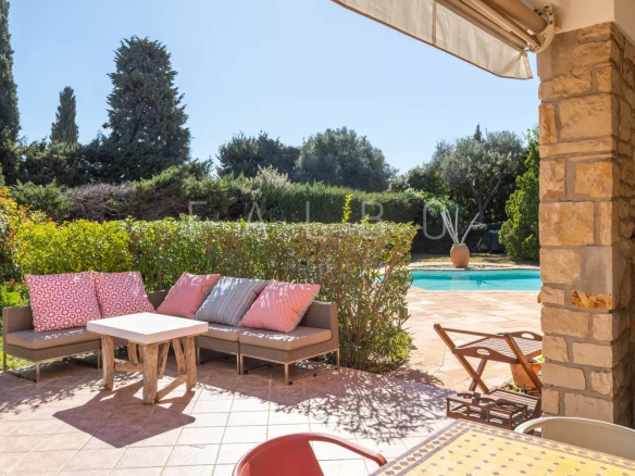 Terrace of a villa with outdoor lounge and swimming pool in La Ciotat