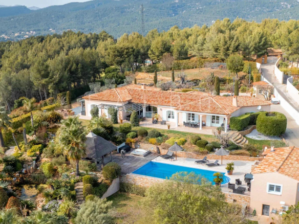 Aerial view of a single-storey villa with swimming pool and landscaped grounds in the hills above La Ciotat.