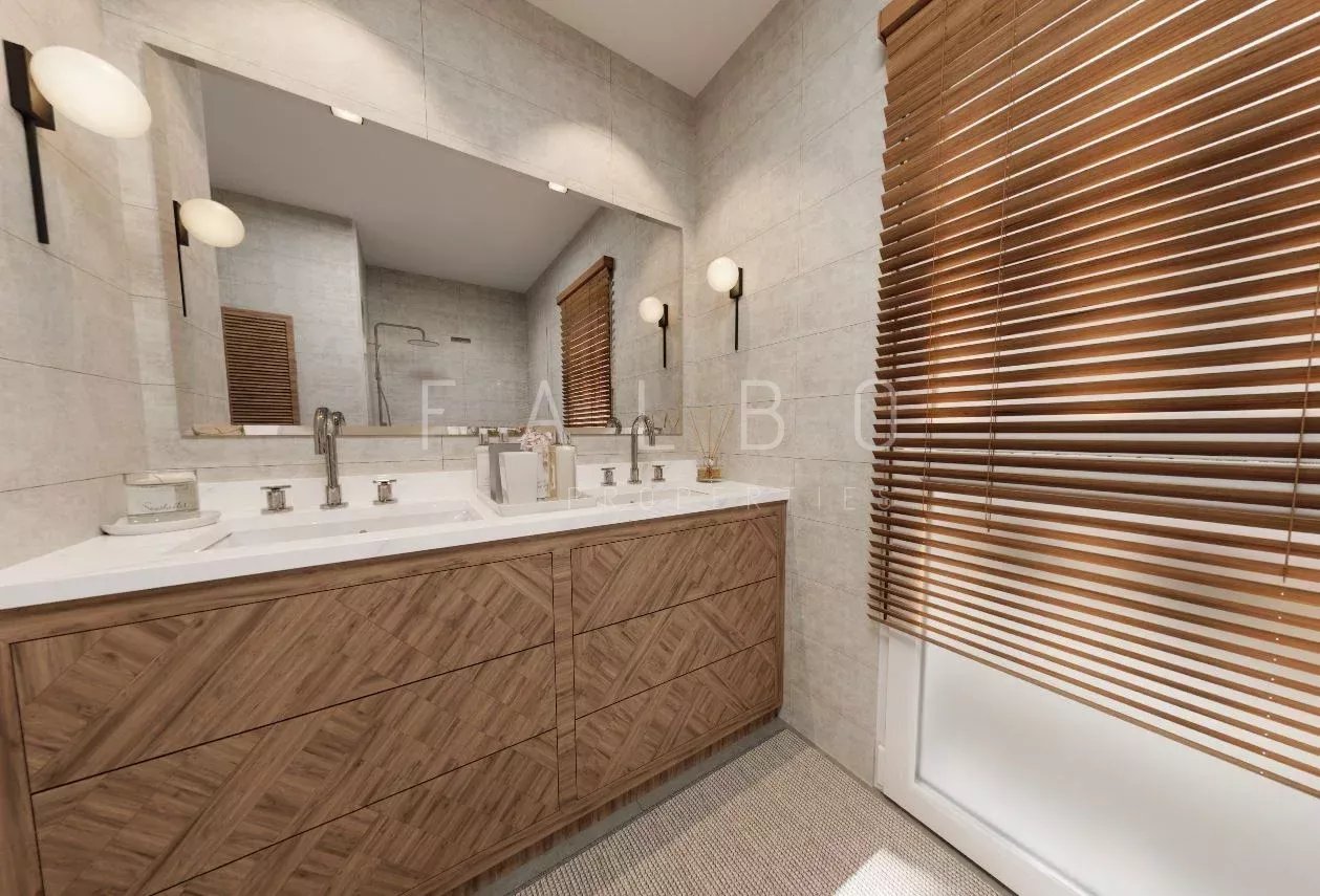 Modern bathroom with wooden furniture and illuminated mirror.