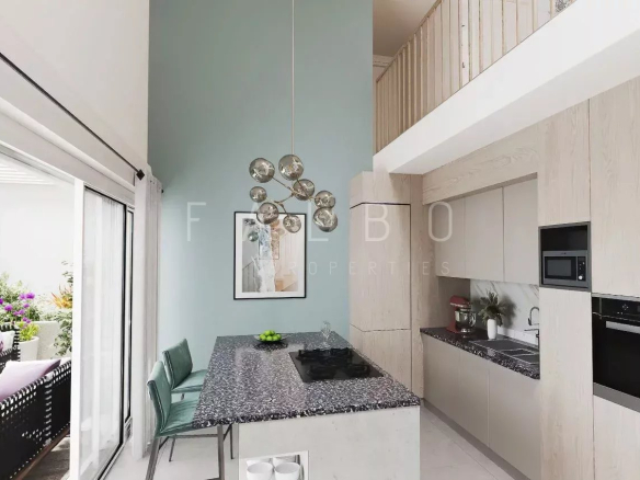Modern and bright kitchen in a 6-room apartment in Marseille 6th district with central island and access to a terrace.