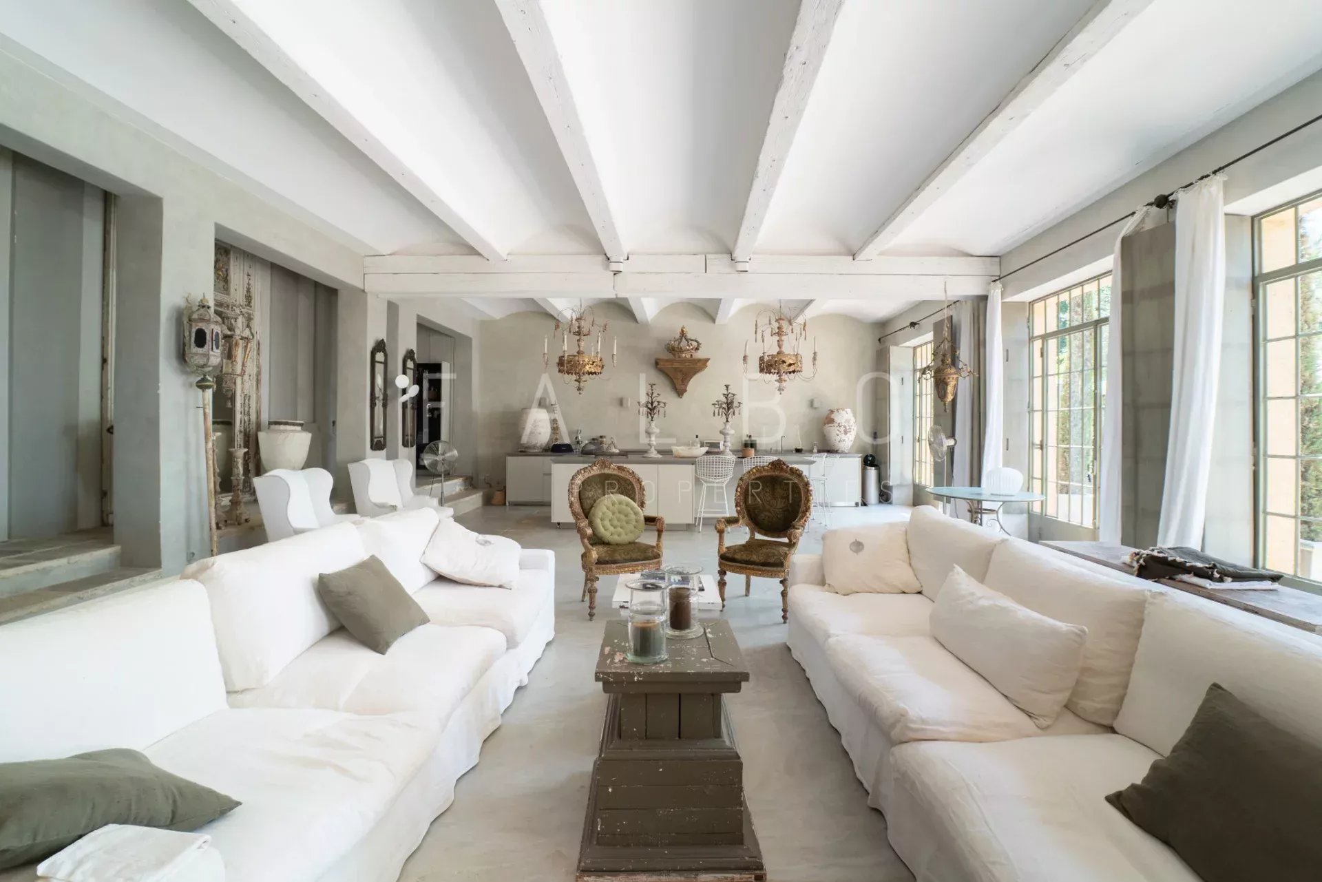 Interior of a Provençal farmhouse Interior of a Provençal farmhouse with a spacious living room and elegant furniture.