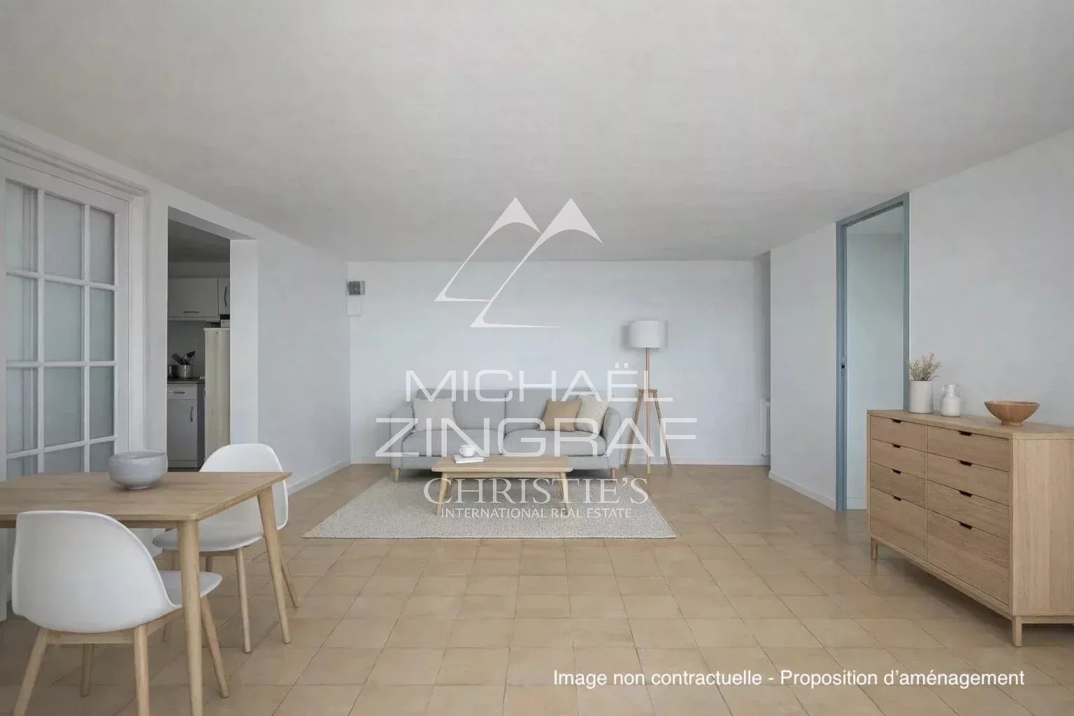 Interior of a modern property with minimalist furniture and natural light.