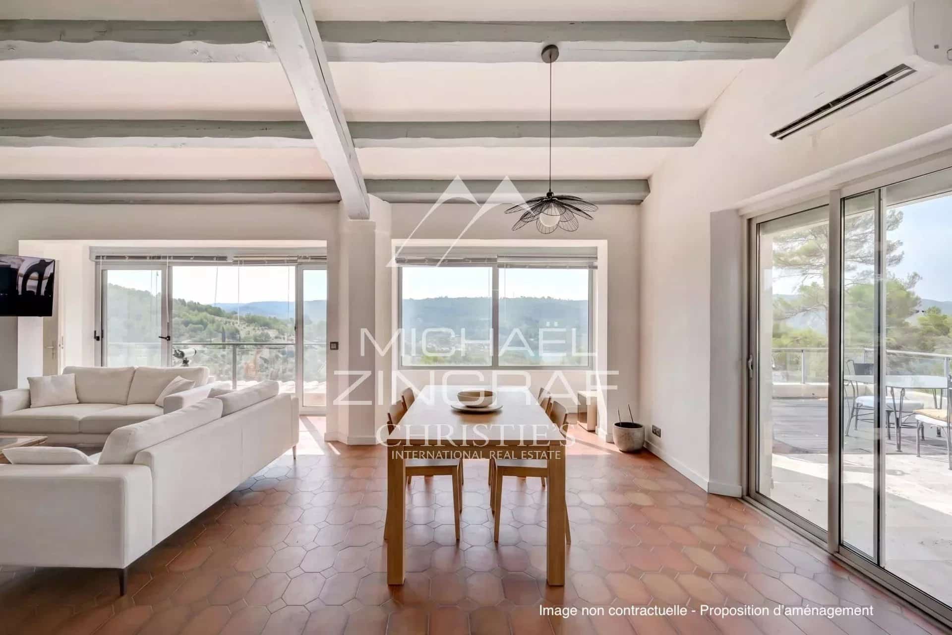Bright interior of a house with a view of Lake Esparron, Verdon Gorges.