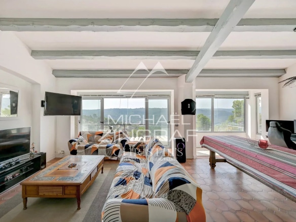 Panoramic view of Lake Esparron and the Verdon Gorges from a bright interior.