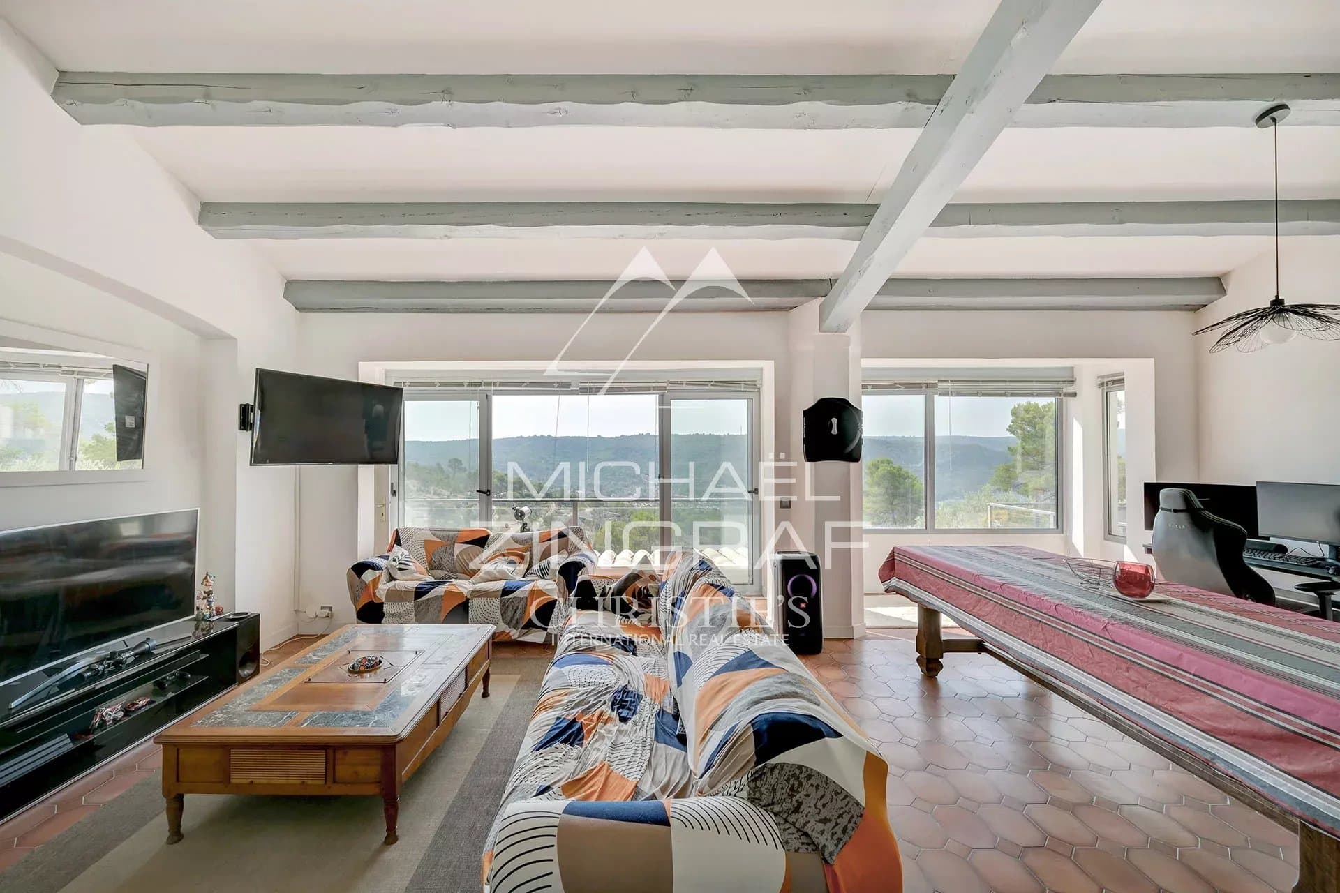 Panoramic view of Lake Esparron and the Verdon Gorges from a bright interior.
