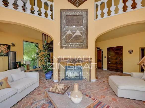 Interior of a spacious property with sofas and decorative elements, Aix-en-Provence.