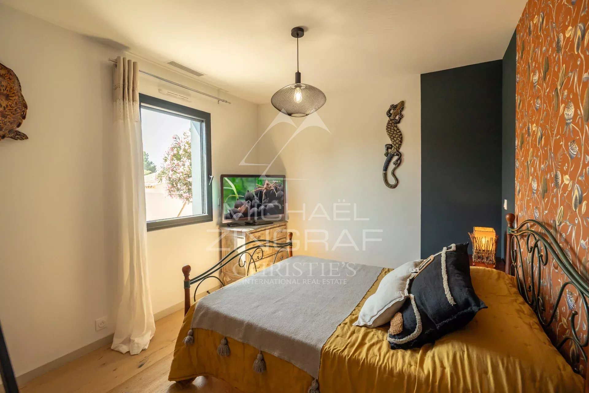 Modern room in Puget Bedroom in a contemporary property in Puget with modern decor and accent wall.