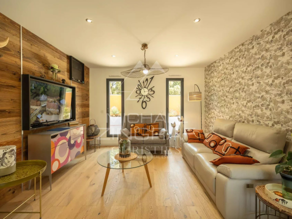 Interior of a contemporary house with a comfortable living room and modern decor.