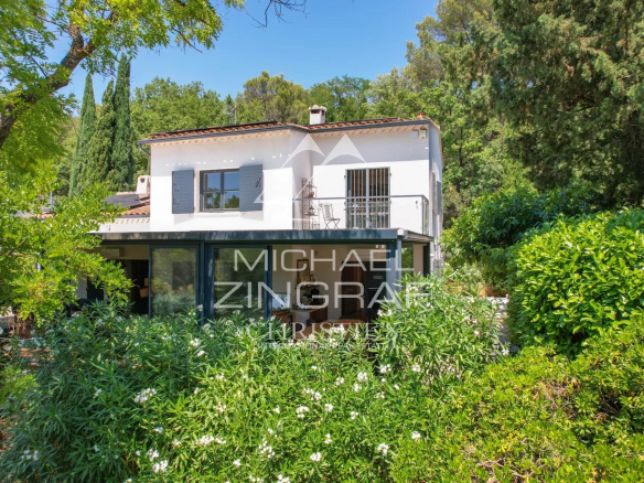 Property with swimming pool surrounded by greenery in Aix-en-Provence.