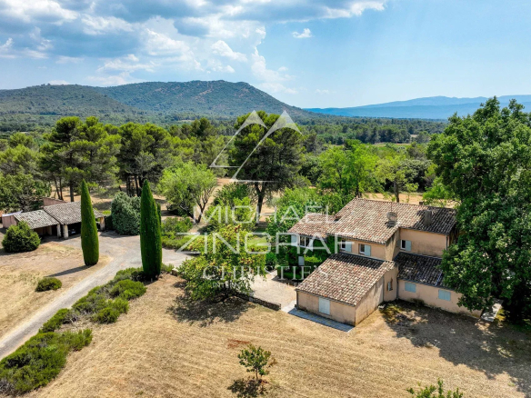 19th century country house surrounded by nature in Jouques, Provence, with olive trees.