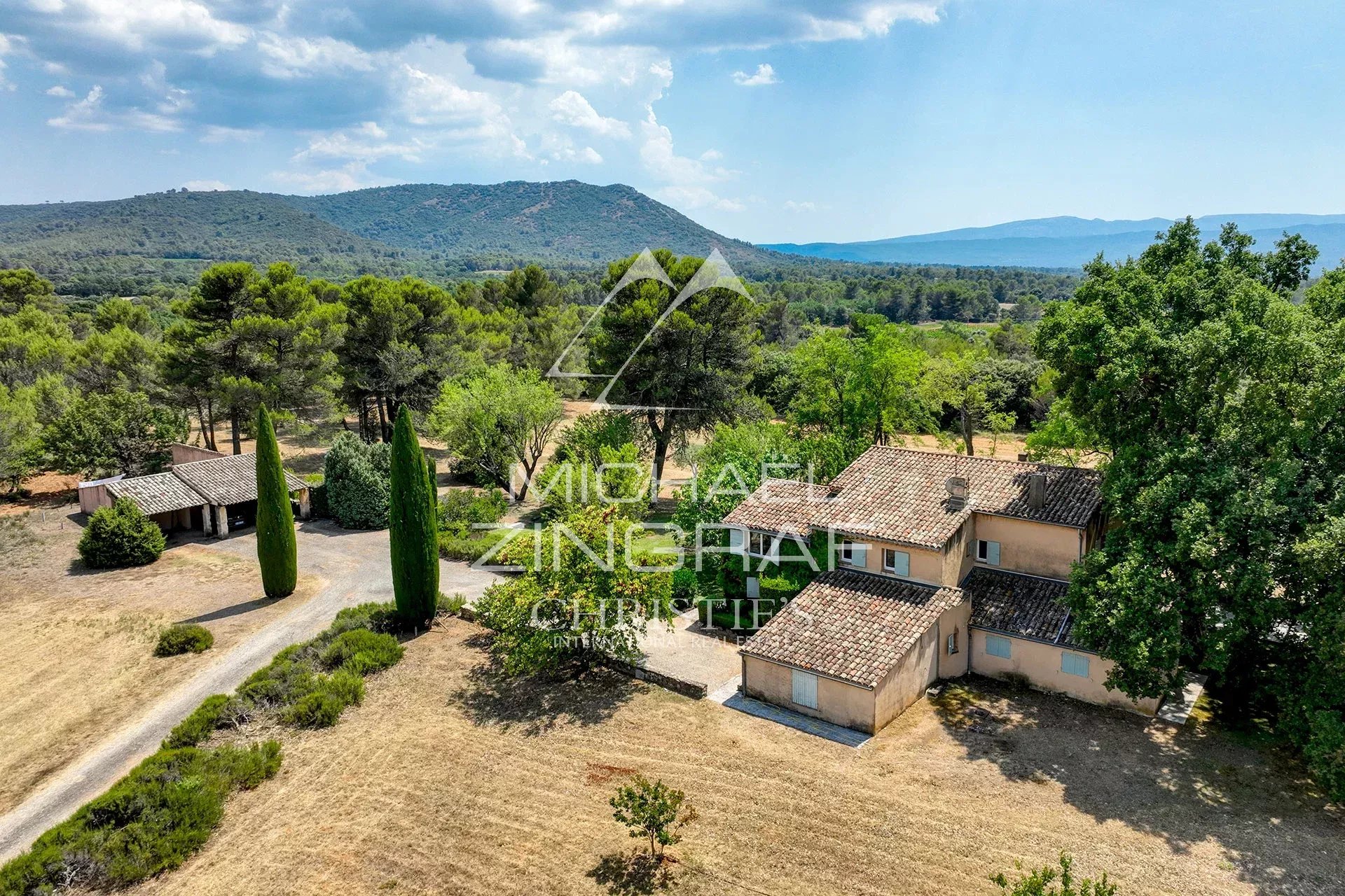 19th-century Provençal country house in Jouques 19th century country house surrounded by nature in Jouques, Provence, with olive trees.