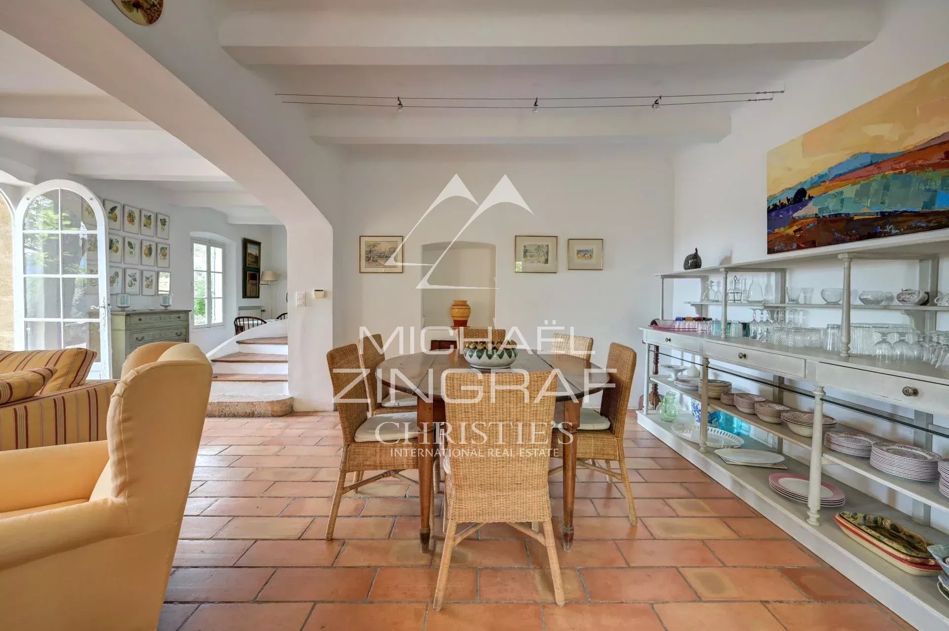 Interior of a Provençal country house Interior of a Provençal country house with dining room and warm decor.