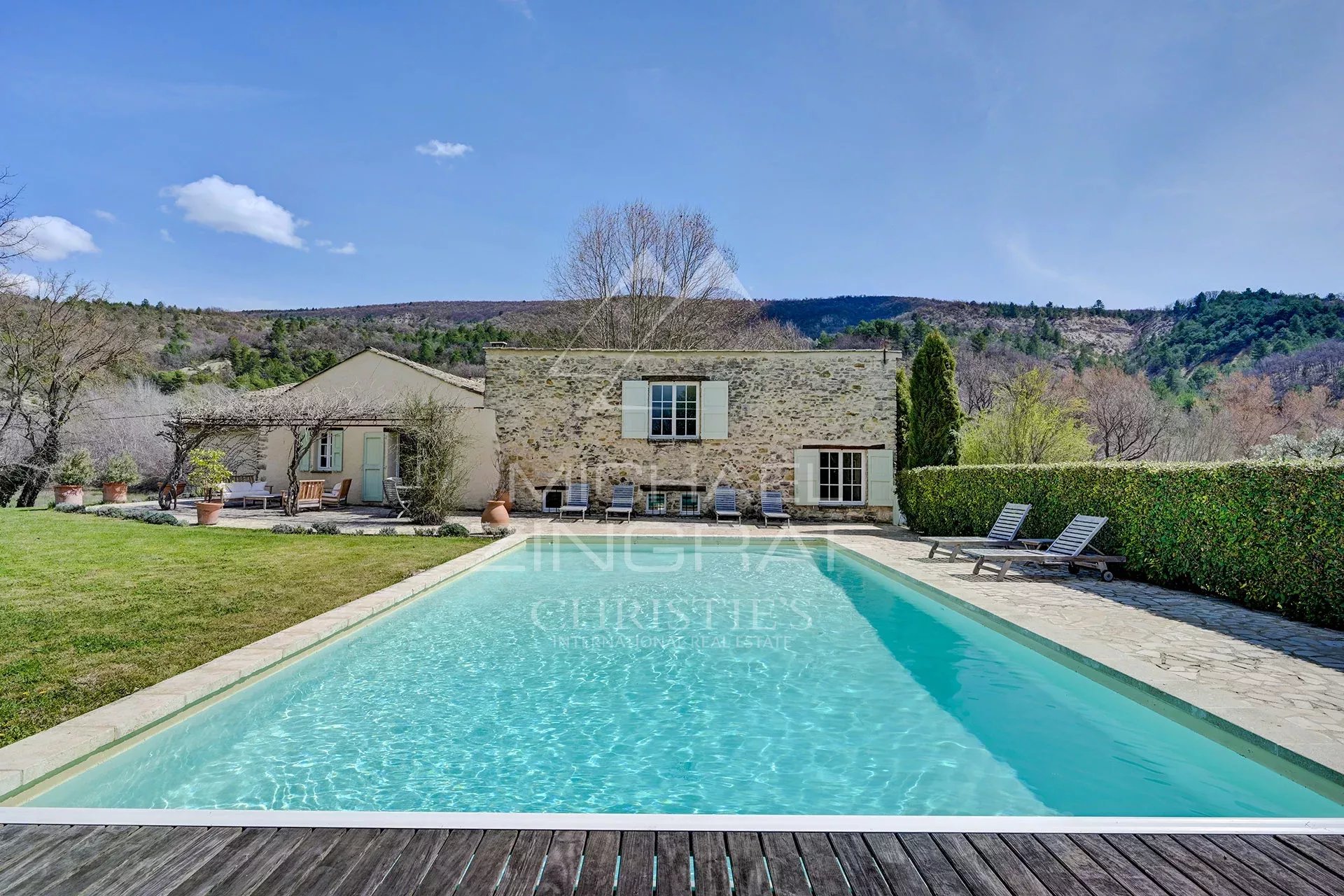 Renovated 17th century mill with swimming pool and green garden in Forcalquier.