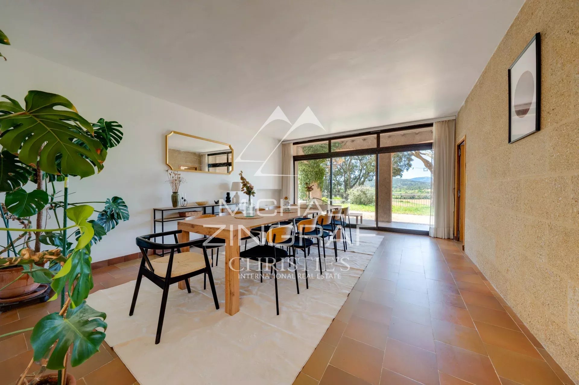 Interior of a 1970s property Interior of a 1970s house overlooking a landscaped park.