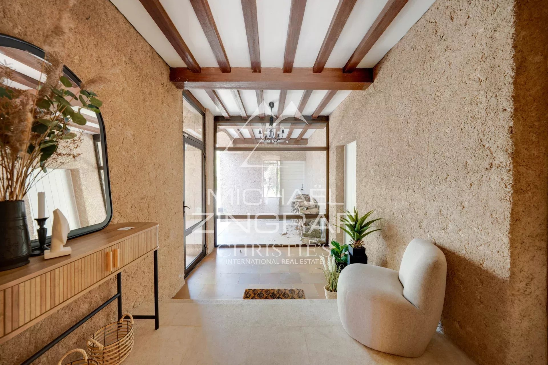 Interior of a 1970s property Interior of a 1970s property with stone walls and modern decor.