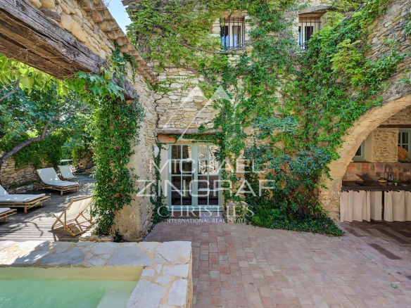 Interior of a renovated silkworm farm with swimming pool and relaxation area, La Fare-les-Oliviers.