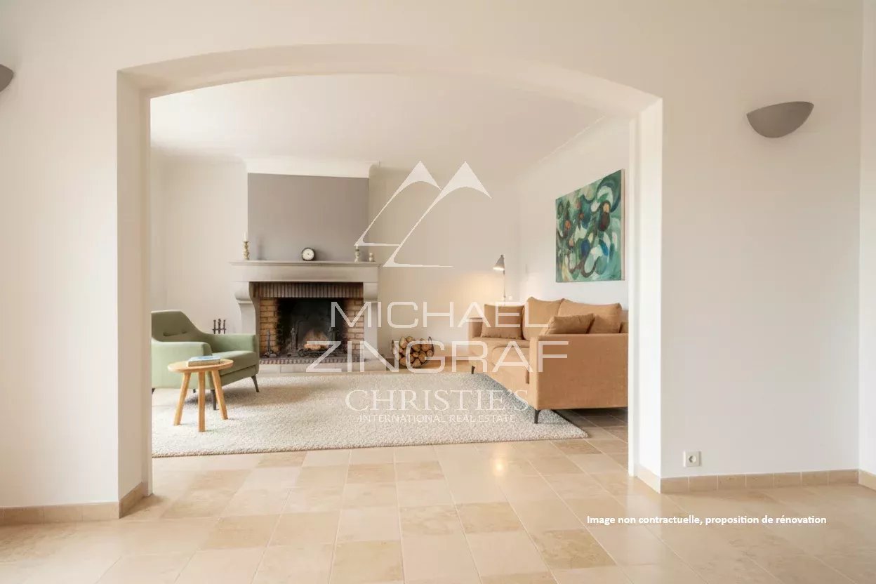 Intérieur d’une bastide à Aix-en-Provence Intérieur d'une bastide avec salon lumineux et cheminée, Aix-en-Provence.