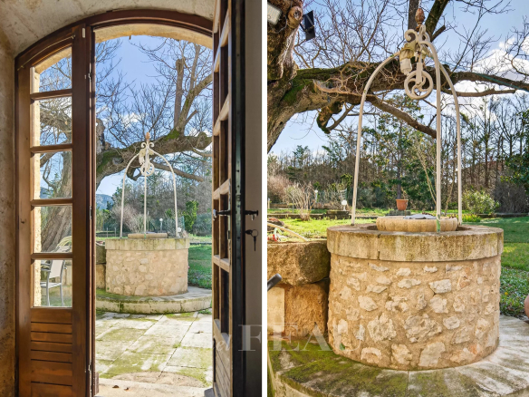 View of a stone well in the garden of a Provençal farmhouse in Cavaillon.