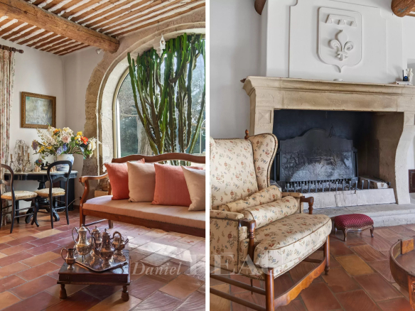 Interior of a Provençal farmhouse with fireplace and comfortable living room in Cavaillon.