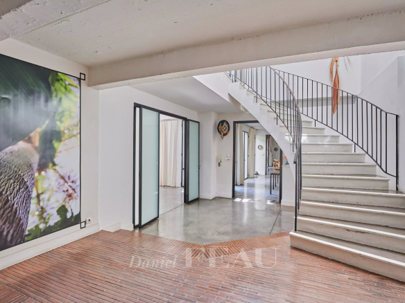 Interior of a house in Marseille 7th district with staircase and modern decoration.