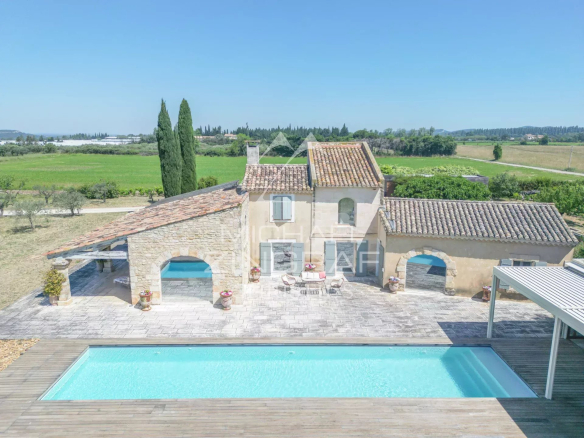 Aerial view of a property with swimming pool and garden, near Arles, Provence.
