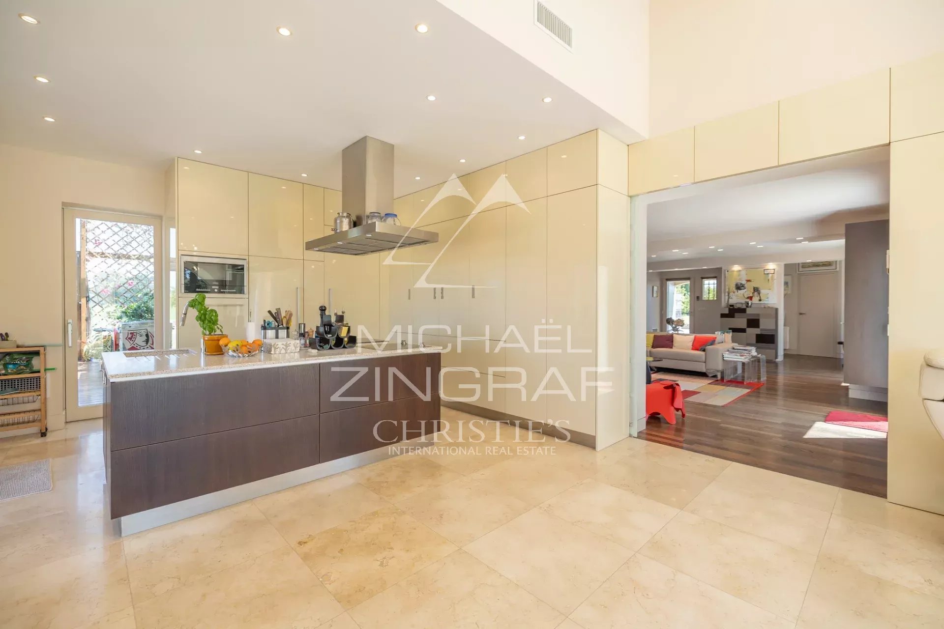 Contemporary cuisine in a property near Arles Modern and bright kitchen with central island in an exceptional property near Arles.
