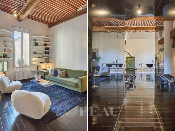 Intérieur d'un appartement rénové avec des poutres apparentes et un mobilier moderne à Aix-en-Provence.