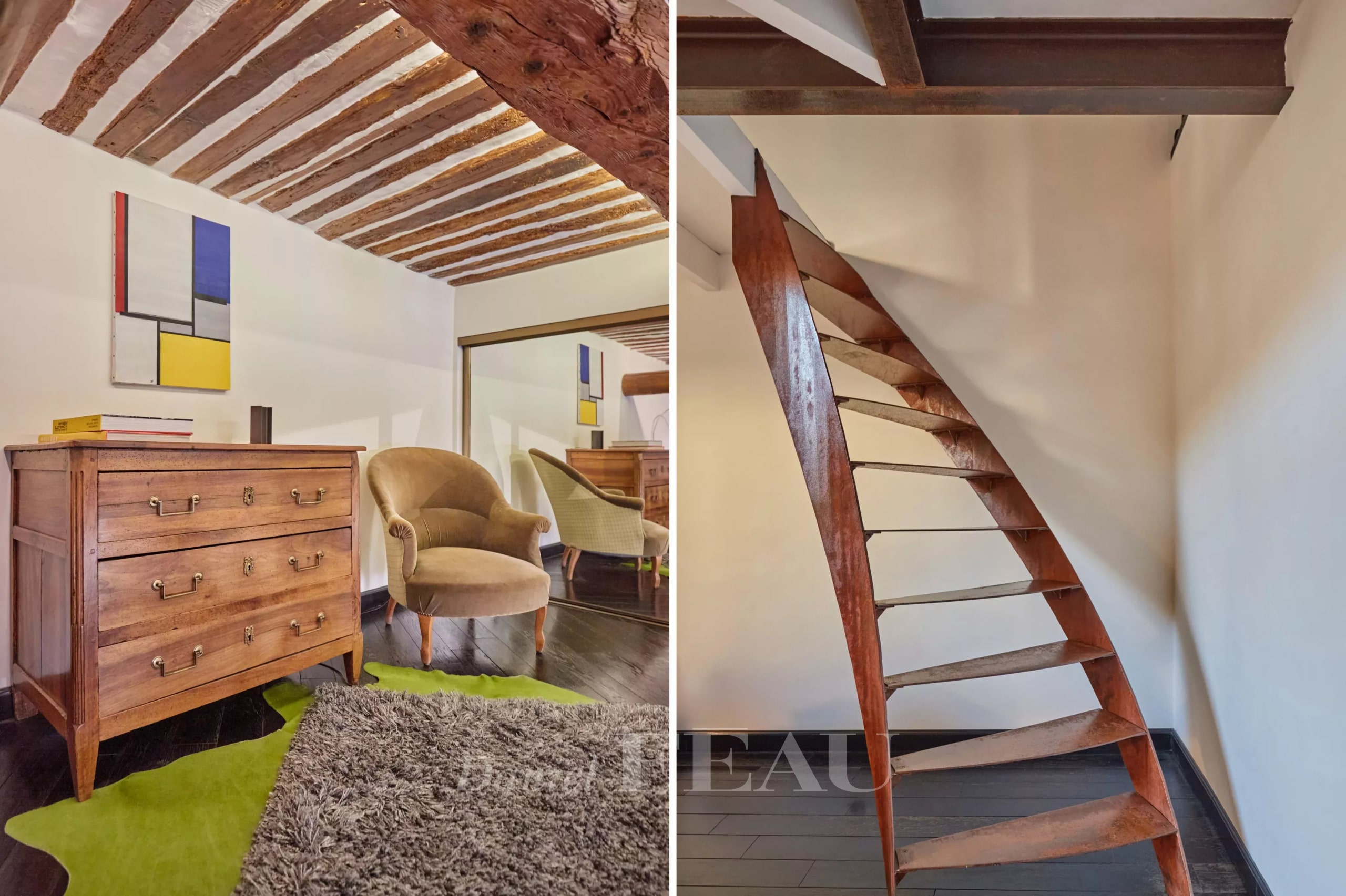 Intérieur d'un appartement ancien rénové à Aix-en-Provence, avec un escalier en bois et des meubles élégants.