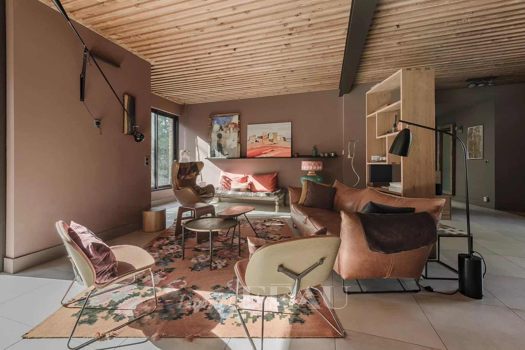 Interior of an architect-designed house in Aix-en-Provence Interior of a modern architect-designed house with a bright living room and contemporary furniture.