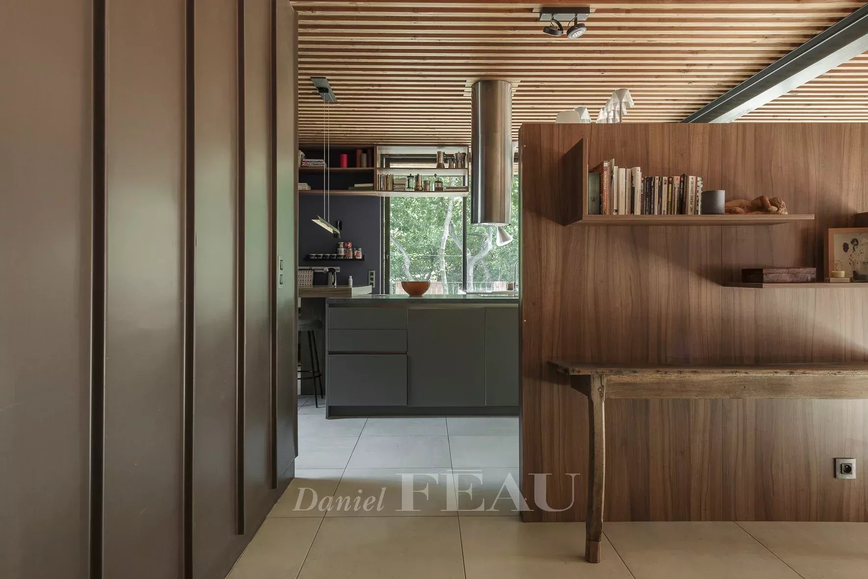Interior of an architect-designed house Interior of a modern architect-designed house with open kitchen and contemporary decor.