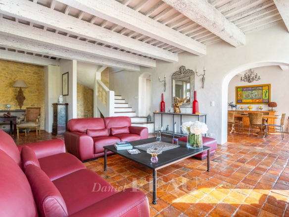 Interior of an 18th century stone house with living room and dining room.