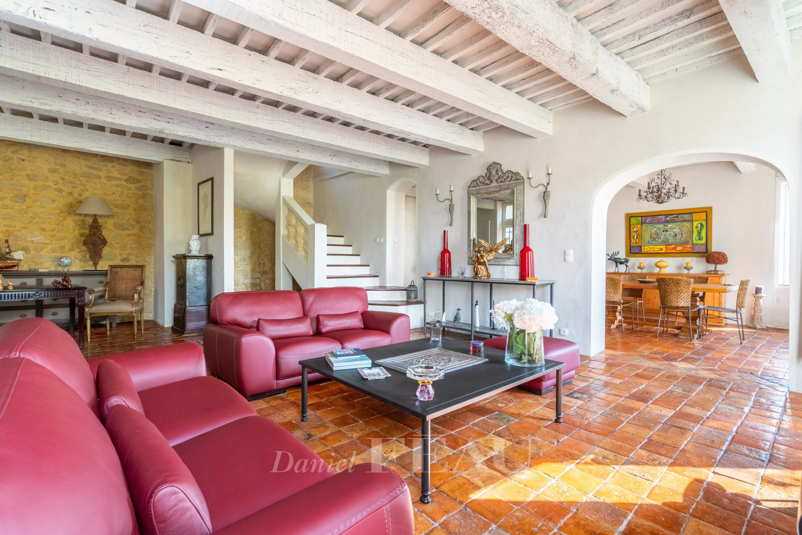Interior of a restored former presbytery Interior of an 18th century stone house with living room and dining room.