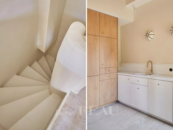 Spiral staircase and modern kitchen in a duplex in Aix-en-Provence.