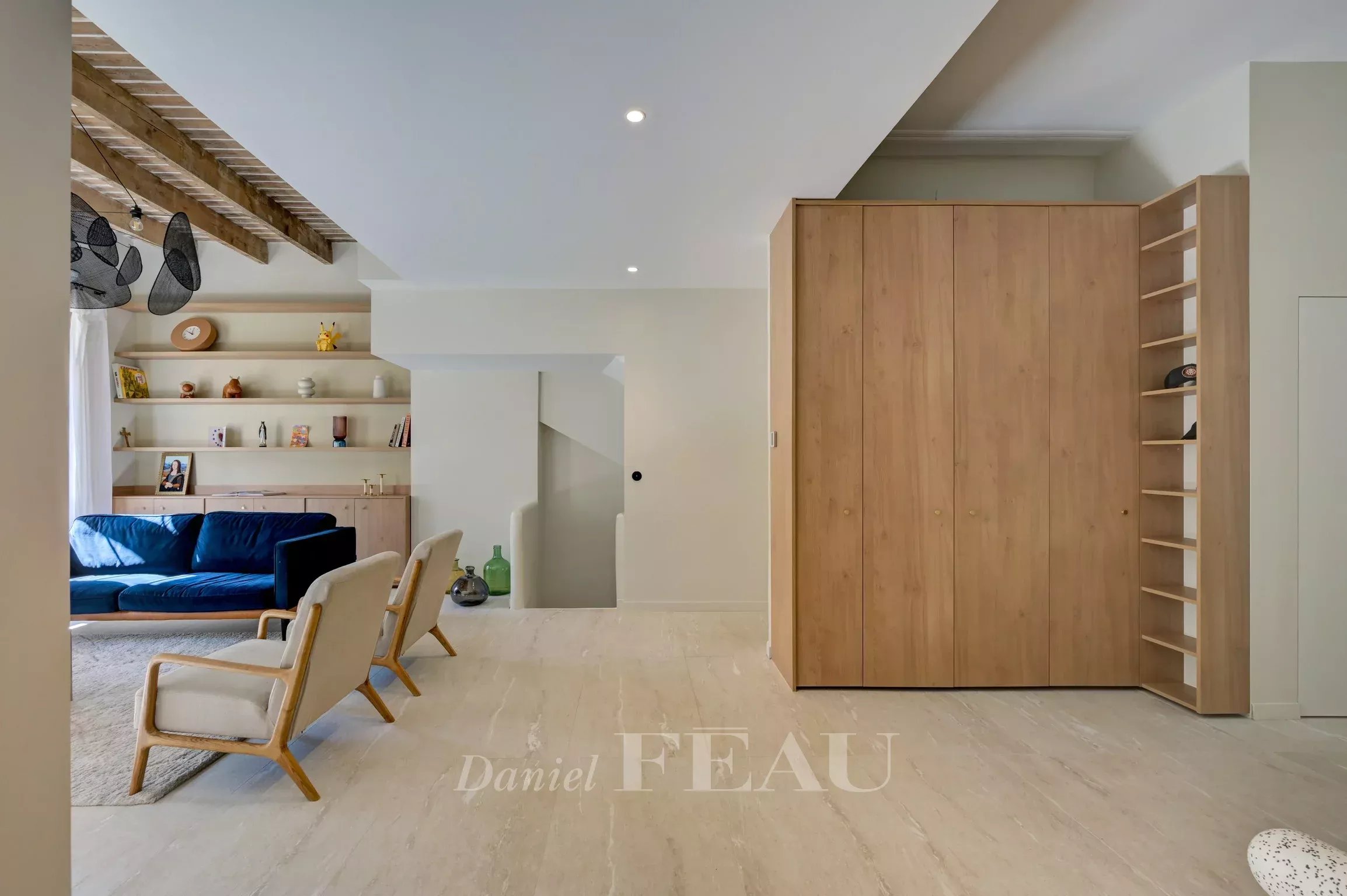 Renovated apartment in Aix-en-Provence Interior of a renovated apartment with living room, wooden furniture and bright space in Aix-en-Provence.