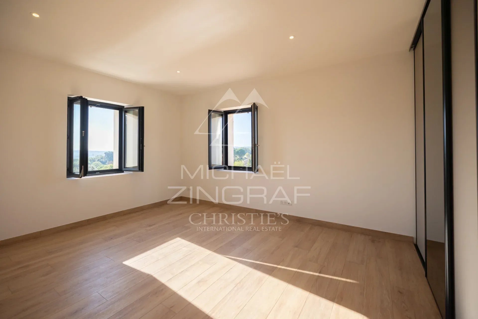 Room in a contemporary villa in Gordes Interior of a bedroom in a contemporary villa in Gordes with natural light